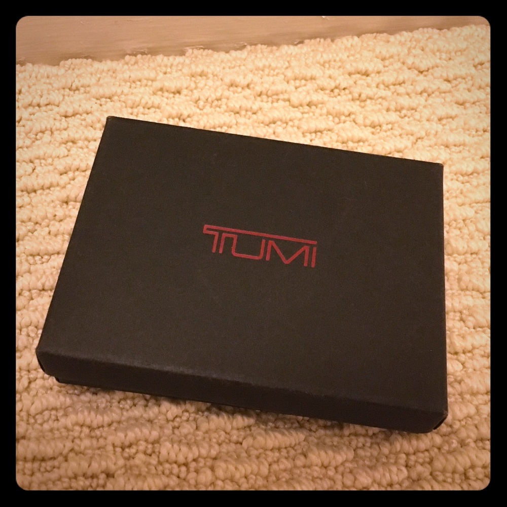 Brand new Tumi black leather bifold wallet